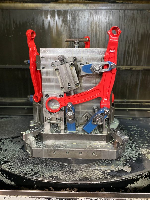 Control arms in a machining fixture
